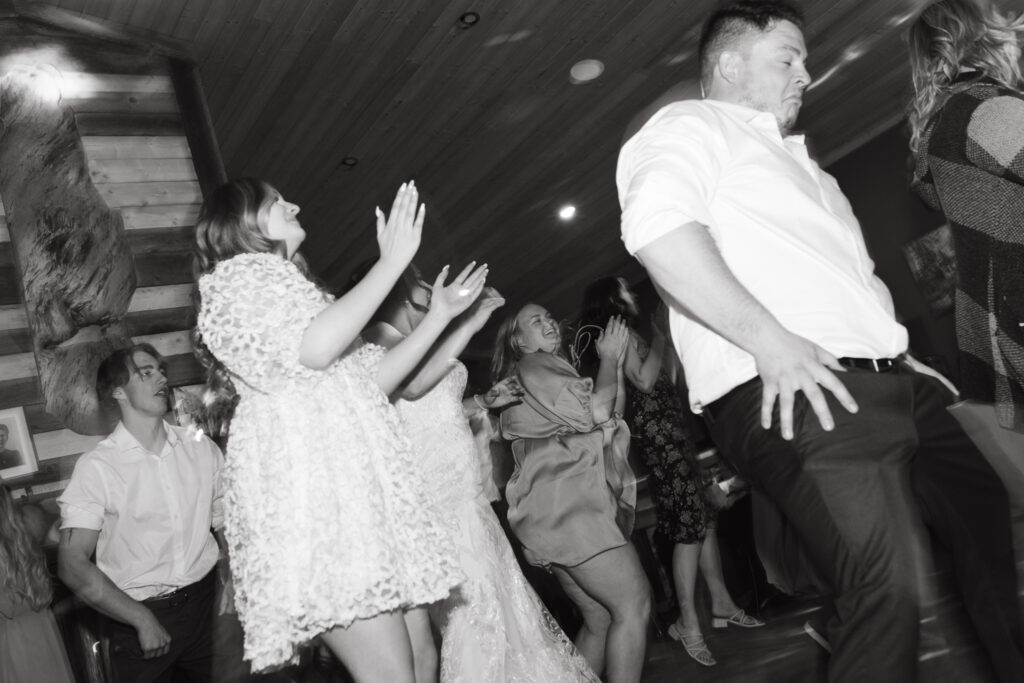 Guests dancing during a lively wedding reception at Ager’s Corner in Saskatoon